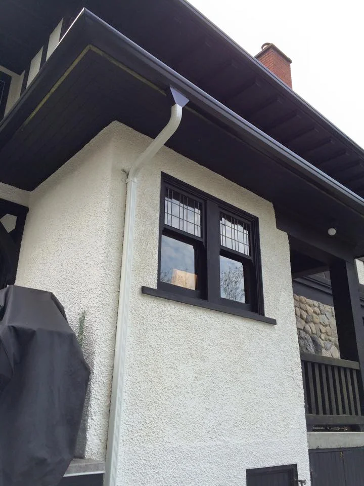 Downspout detail on a residential exterior — Aarsen Gutters, Nanaimo BC